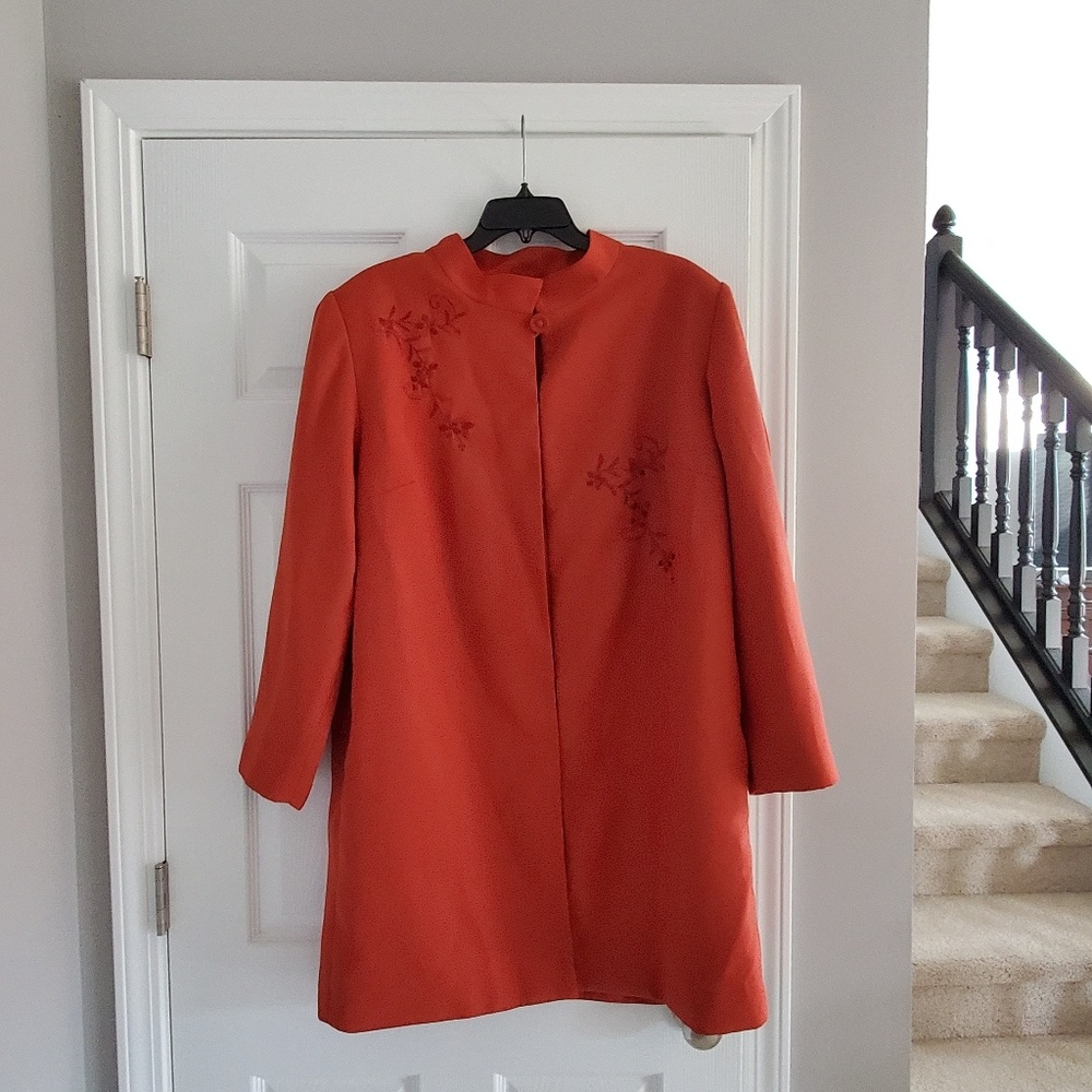 E.M.R coat like new